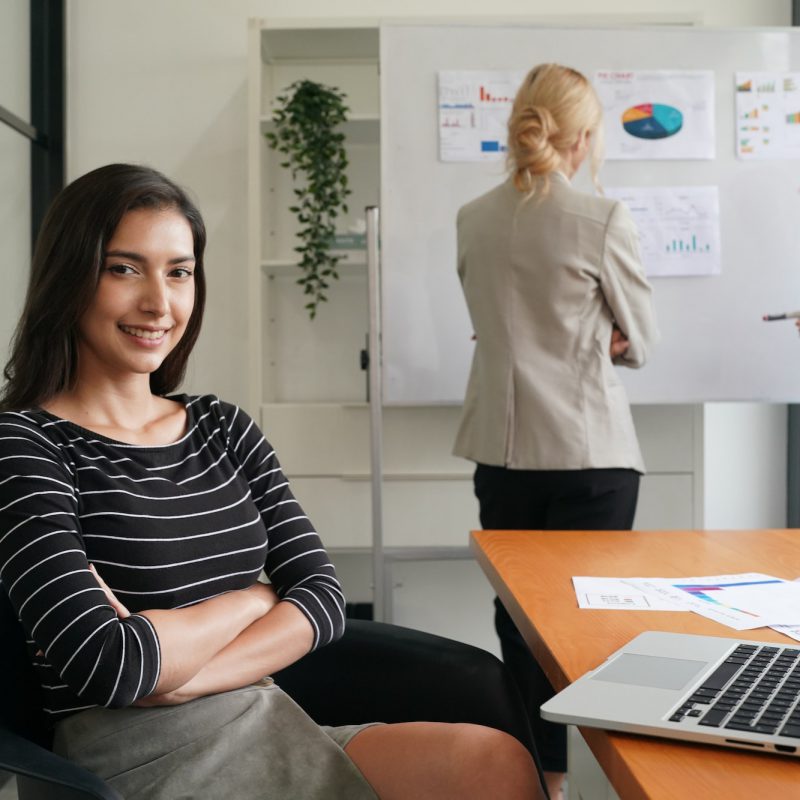 Successful business woman looking confident and smiling